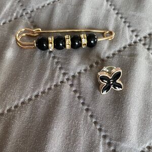 Elegant Black and Gold Brooch Set